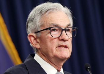 Federal Reserve holds interest rates steady as consumer confidence improves and inflation slows