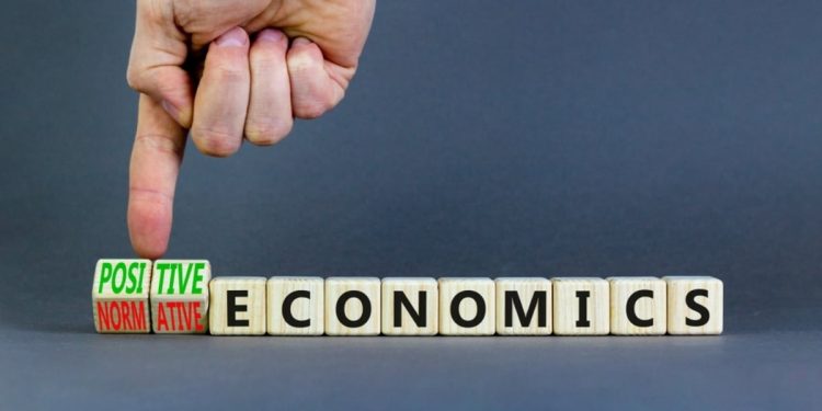What is positive vs normative economics?