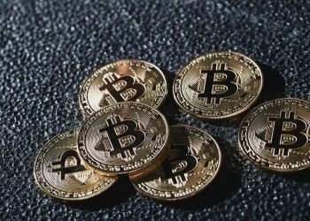 Bitcoin Hits $46K, ETFs Break Records Amid Economic Caution