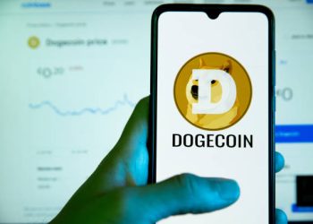 Dogecoin Caught In Compression: Descending Triangle Warns Of Potential Collapse
